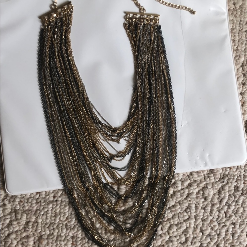 Women’s gold multi chain necklace.